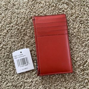 Coach orange glittery card case